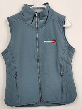 Zero restriction vest teal with company logo on it  SzM